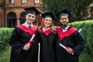 Happy international graduates holding diplomas, showcasing success with the best study abroad consultants